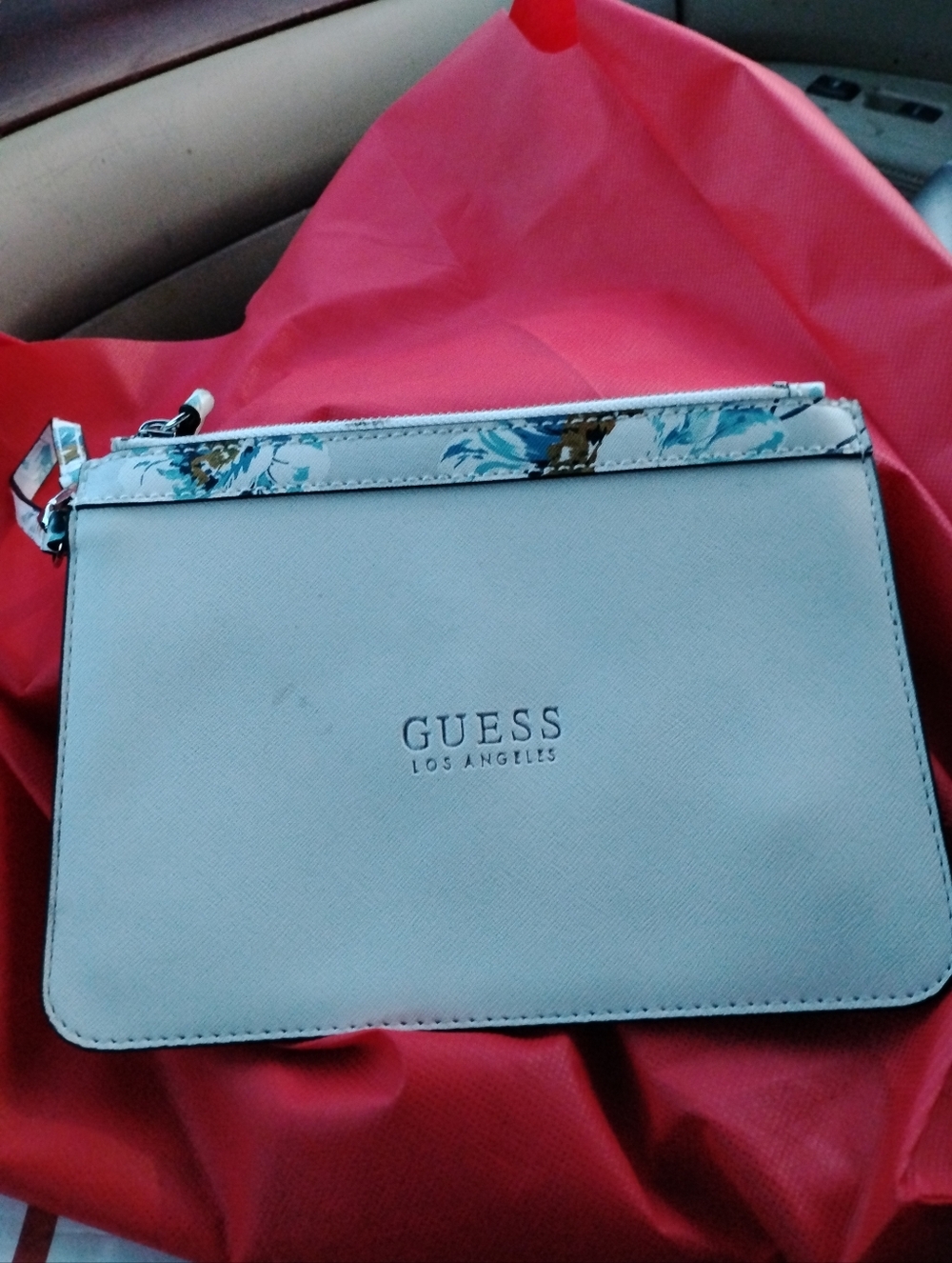 GUESS Cream Wristlet with Floral Trim